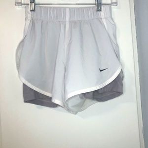 White Nike shorts